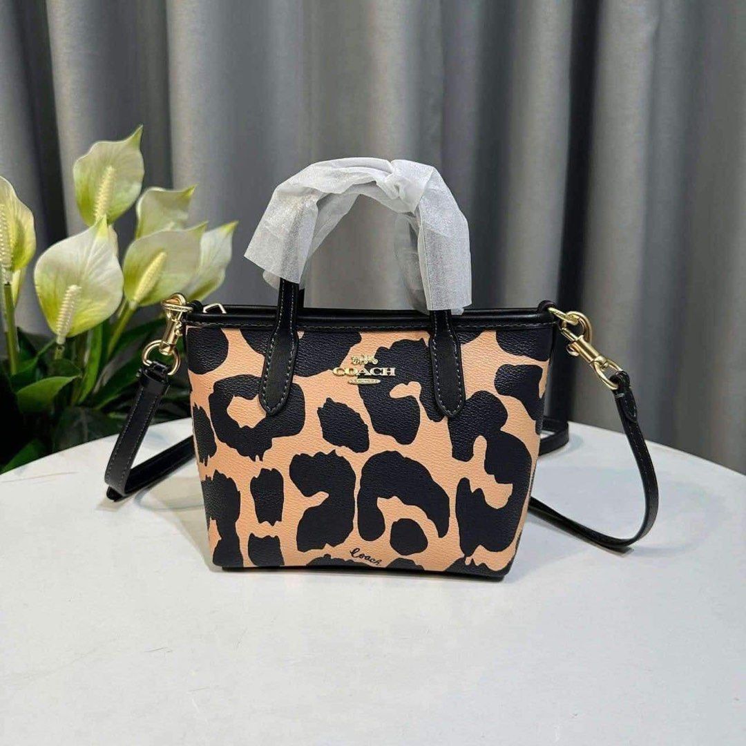 Coach CITY MINI TOTE BAG WITH LEOPARD PRINT (Category: Luxury Bags & Wallets) located in Rizal. Submitted by LuxbyMarifrance (Listing ID 1338242445, Image 2). Description: 🏷️ 2,100 only + SF 🧳 Coach CITY MINI TOTE BAG WITH LEOPARD PRINT 📏 6” (L) x 5 1/2” (H) x 3 1/2” 📌 with dust bag, paper bag and care card ✨All trademarks, logos and brand names are reserved and property of the original brand owners. #coachph #authenticqualitybagsph #authenti