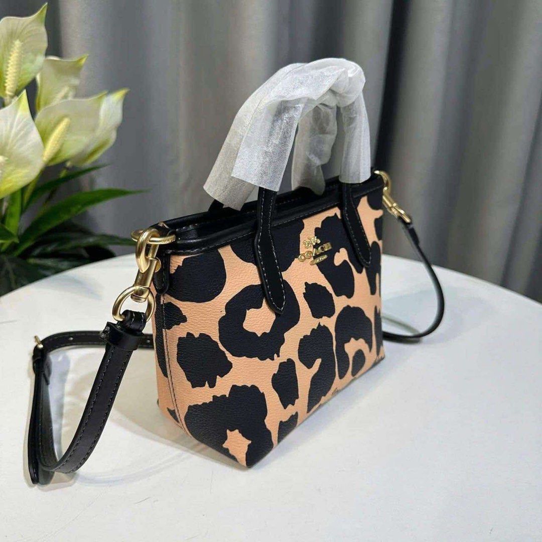 Coach CITY MINI TOTE BAG WITH LEOPARD PRINT (Category: Luxury Bags & Wallets) located in Rizal. Submitted by LuxbyMarifrance (Listing ID 1338242445, Image 3). Description: 🏷️ 2,100 only + SF 🧳 Coach CITY MINI TOTE BAG WITH LEOPARD PRINT 📏 6” (L) x 5 1/2” (H) x 3 1/2” 📌 with dust bag, paper bag and care card ✨All trademarks, logos and brand names are reserved and property of the original brand owners. #coachph #authenticqualitybagsph #authenti
