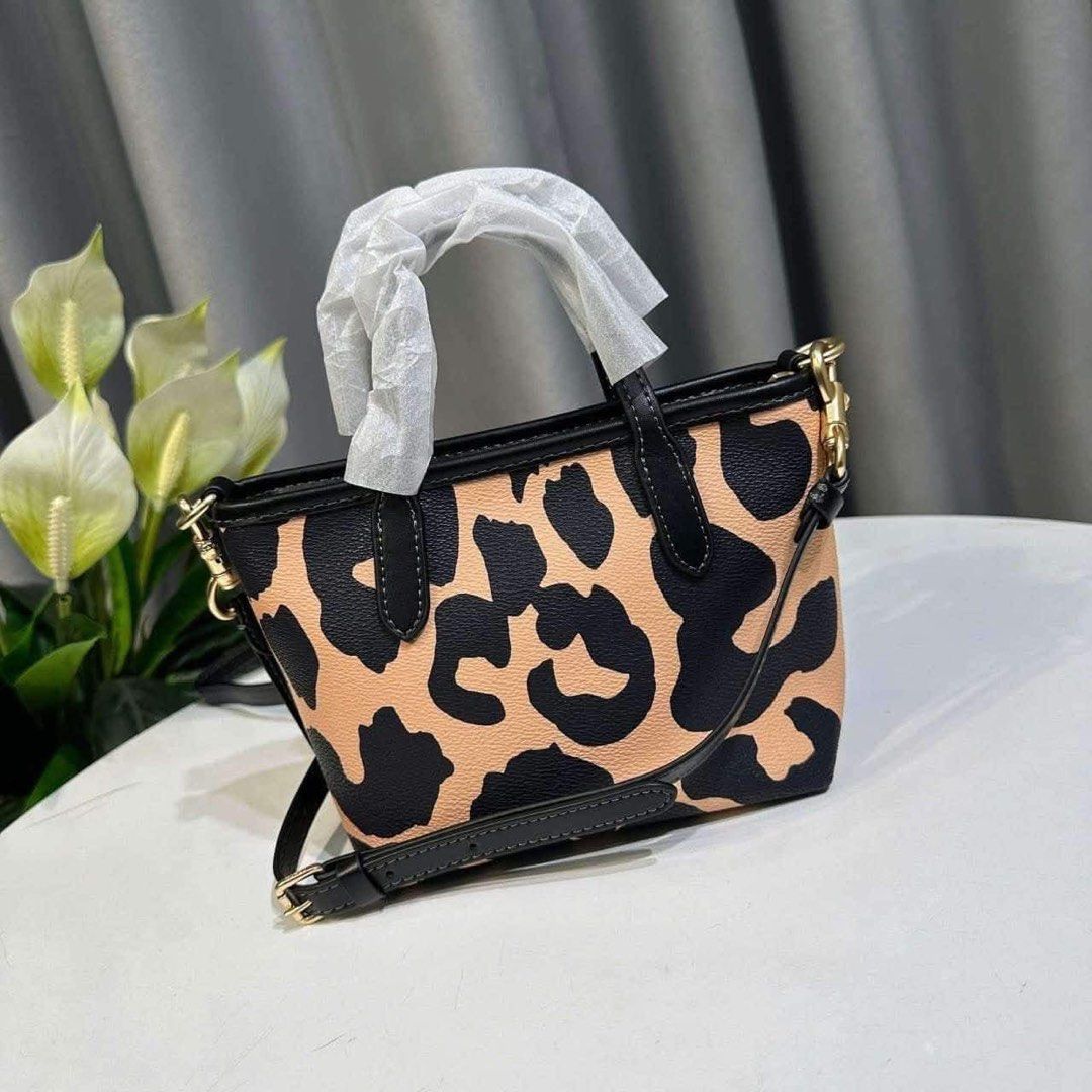 Coach CITY MINI TOTE BAG WITH LEOPARD PRINT (Category: Luxury Bags & Wallets) located in Rizal. Submitted by LuxbyMarifrance (Listing ID 1338242445, Image 1). Description: 🏷️ 2,100 only + SF 🧳 Coach CITY MINI TOTE BAG WITH LEOPARD PRINT 📏 6” (L) x 5 1/2” (H) x 3 1/2” 📌 with dust bag, paper bag and care card ✨All trademarks, logos and brand names are reserved and property of the original brand owners. #coachph #authenticqualitybagsph #authenti