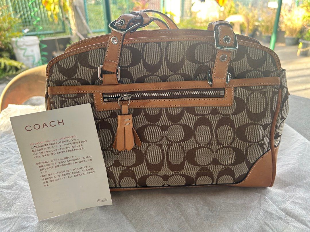 coach small handbag (Category: Luxury Bags & Wallets) located in Malabon City. Submitted by everythinggoeson (Listing ID 1338150885, Image 1). Description: authentic & clean very nice in actual no rubs with small water mark only (see pic).