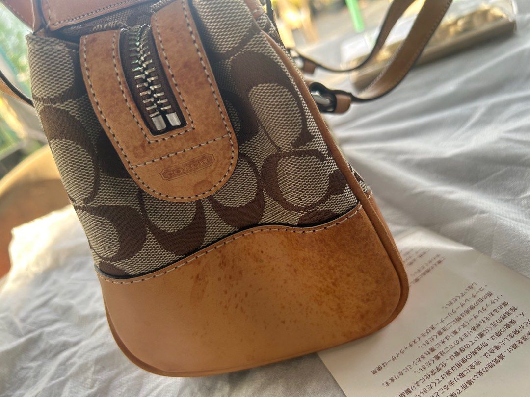 coach small handbag (Category: Luxury Bags & Wallets) located in Malabon City. Submitted by everythinggoeson (Listing ID 1338150885, Image 2). Description: authentic & clean very nice in actual no rubs with small water mark only (see pic).