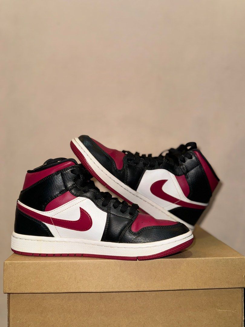 Jordan 1 Mid "Noble Red" Mens 7 (Category: Sneakers) located in Manila. Submitted by mmadiee (Listing ID 1338182083, Image 2). Description: Gifted to me last 2022. Didn't use that much because it doesn't fit me. Recently cleaned/unyellowed. Replacement box only. .