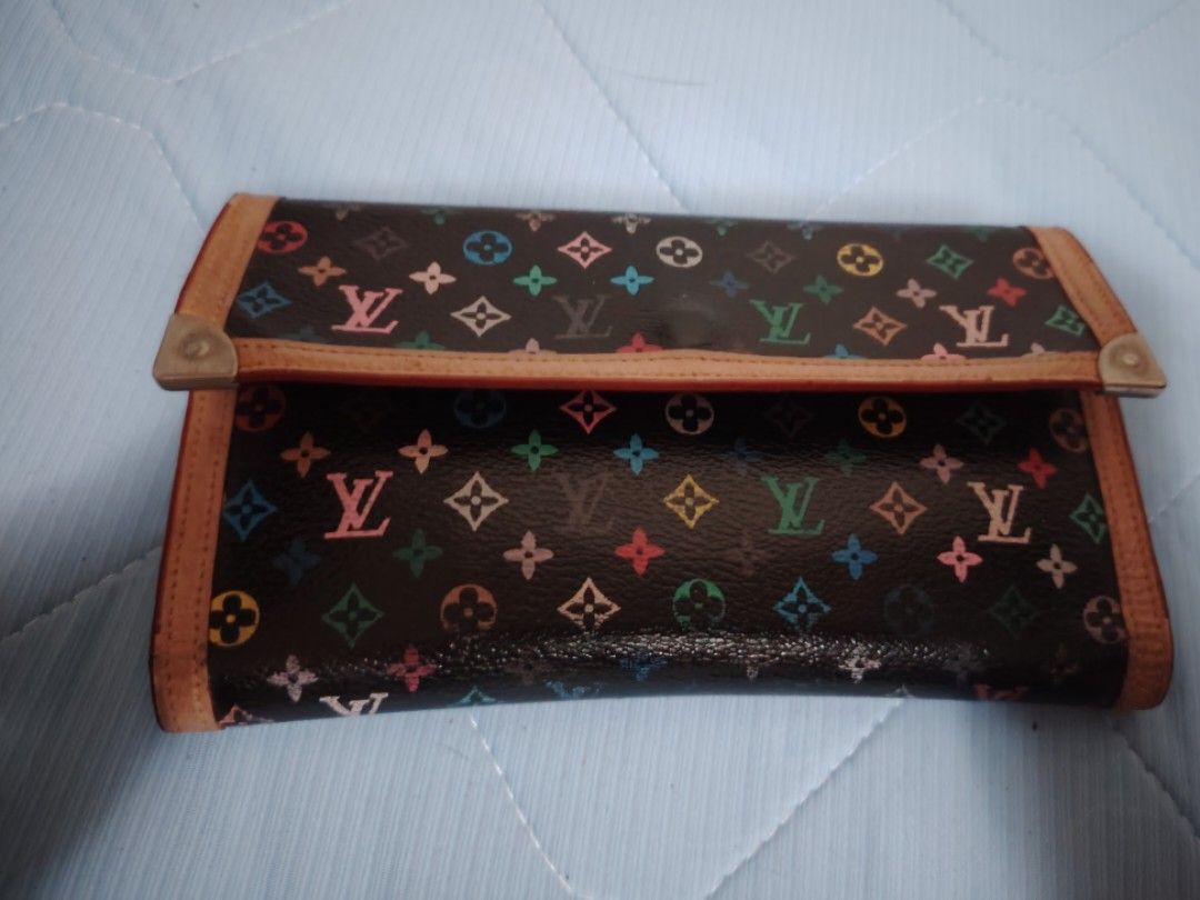 LV wallet (Category: Luxury Bags & Wallets) located in Manila. Submitted by misswvnscart.ph (Listing ID 1338181592, Image 1). Description: Original LV wallet multicolored Loob lang di maganda pero maganda pa Made in japan oroginal frowm japan.
