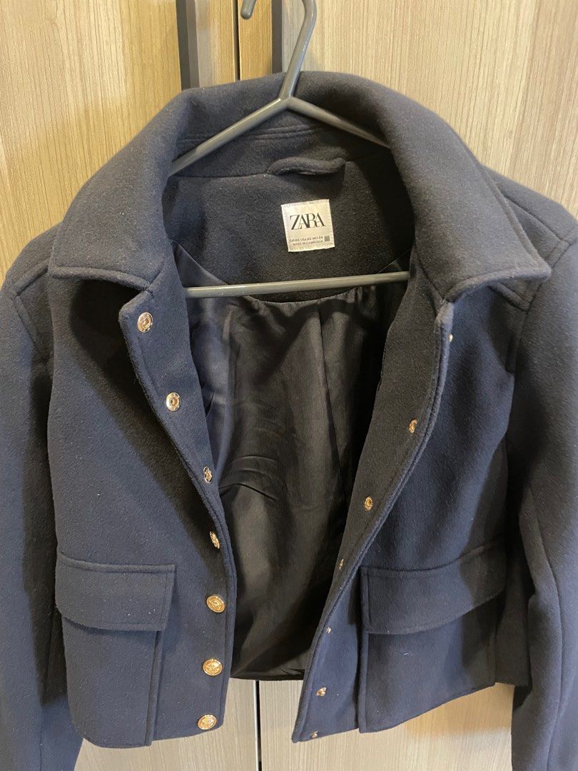 Original unworn Zara short coat (Category: Coats, Jackets and Outerwear) located in Taguig. Submitted by BellaC (Listing ID 1338174871, Image 3). Description: Original Zara short coat with gold buttons Color: navy blue / dark blue Size: XS .