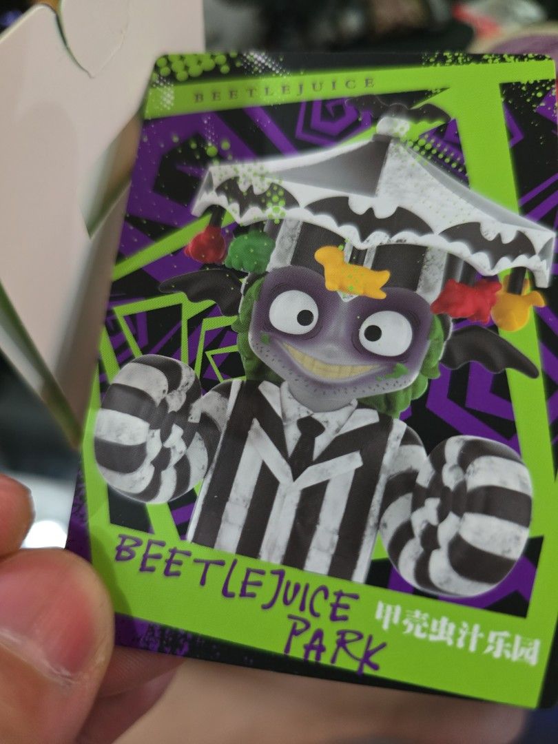 Popmart Beetlejuice Park (Category: Toys & Games) located in Singapore. Submitted by evangoh1987 (Listing ID 1338291541, Image 1). Description: Brand new in foil! opened to check card!.