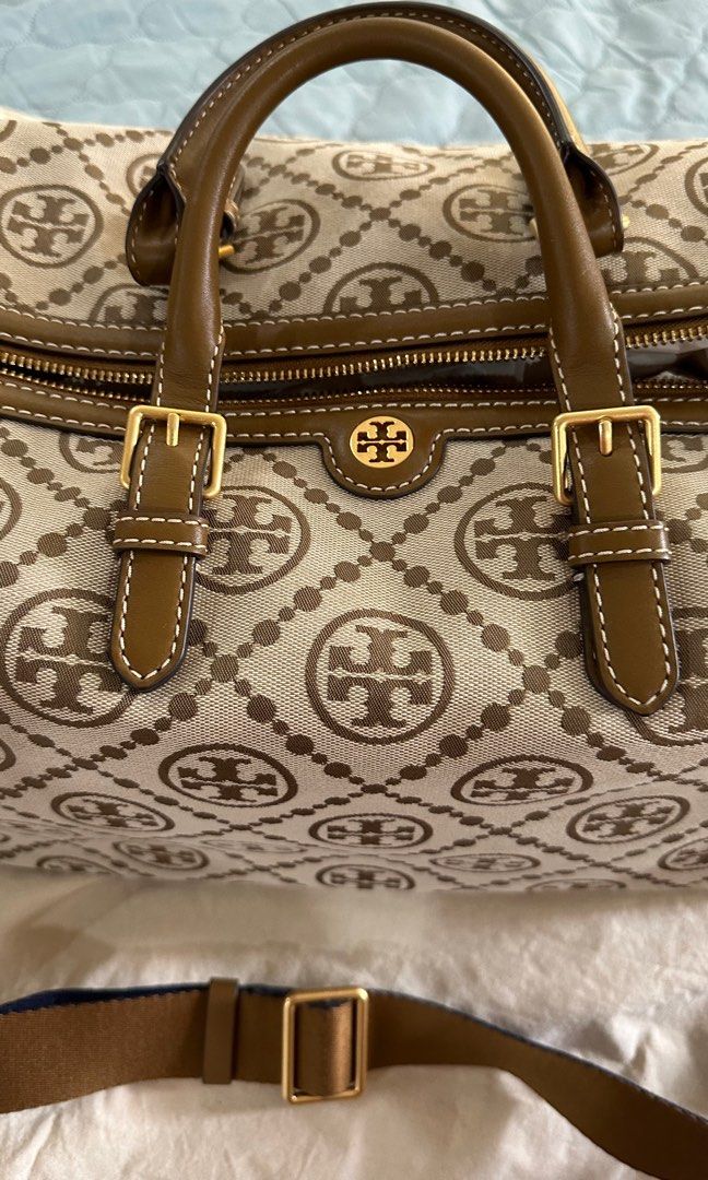 Tory Burch Monogram Jacquard Oversized Duffle Bag (Category: Luxury Bags & Wallets) located in Las Pinas. Submitted by pamshopper (Listing ID 1338167557, Image 2). Description: Brand new Oversized Duffle Bag in Hazel Color Dimensions: Length :20inches Height : 12inches Width : 9inches With Tory Burch dust bag .
