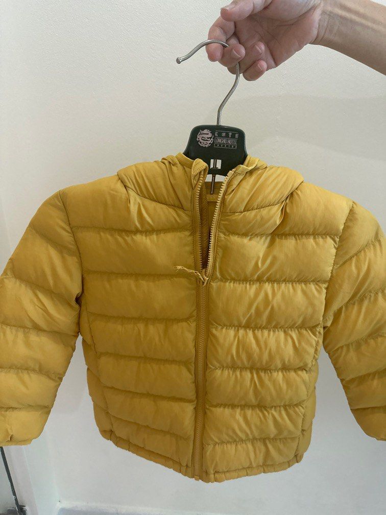 Uniqlo Light Warm Padded Parka in yellow winter jacket Babies Kids Babies Kids Fashion on Carousell