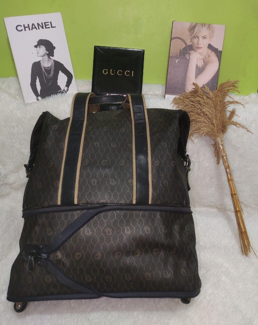 VINTAGE CHRISTIAN DIOR (Category: Luxury Bags & Wallets) located in Manila. Submitted by everythinghasaprice (Listing ID 1338285703, Image 1). Description: VINTAGE CHRISTIAN DIOR BLACK/BROWN MONOGRAM HONEYCOMB LEATHER WITH FOUR WHEELS AND EXPANDABLE ZIPPER MADE IN SPAIN.