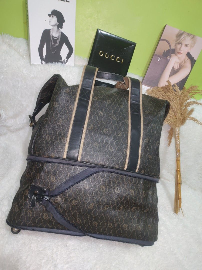 VINTAGE CHRISTIAN DIOR (Category: Luxury Bags & Wallets) located in Manila. Submitted by everythinghasaprice (Listing ID 1338285703, Image 2). Description: VINTAGE CHRISTIAN DIOR BLACK/BROWN MONOGRAM HONEYCOMB LEATHER WITH FOUR WHEELS AND EXPANDABLE ZIPPER MADE IN SPAIN.