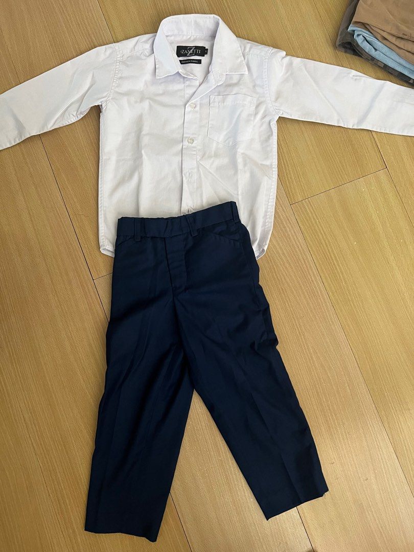 Boy 4-5 yr old formal wear (Category: Babies & Kids Fashion) located in Quezon City. Submitted by _hellopanda (Listing ID 1338312894, Image 1). Description: White long sleeve Navy slacks Very nice material.