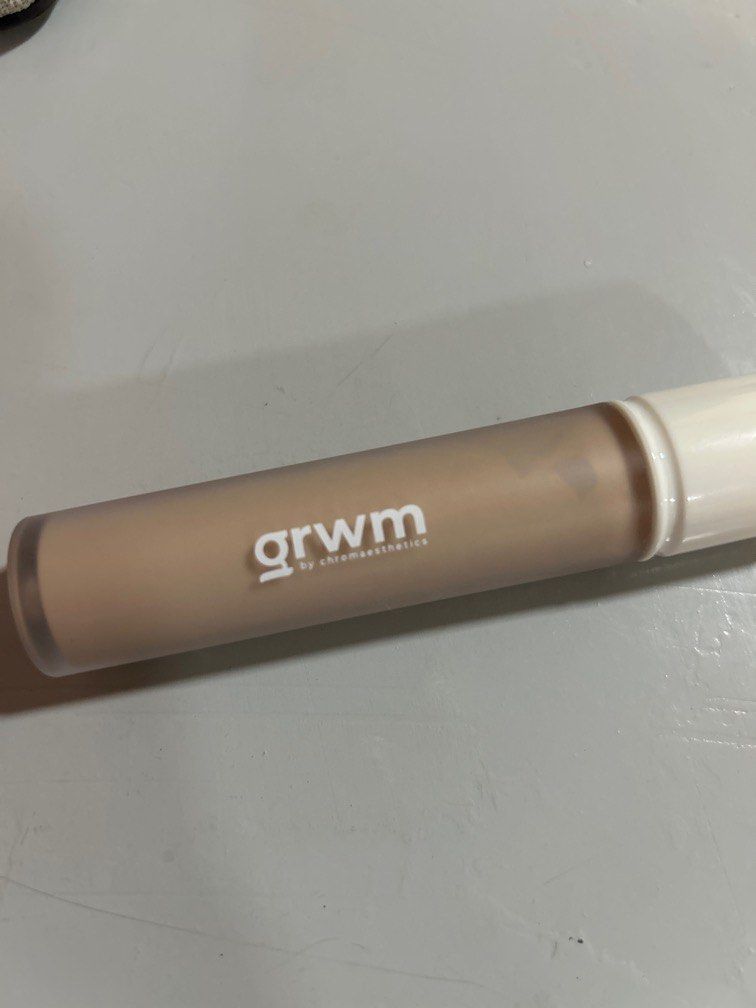 GRWM radiant tint concealer (SEPIA) (Category: Makeup) located in Manila. Submitted by eri.sieri (Listing ID 1338434160, Image 1). Description: GRWM RADIANCE TINT shade: SEPIA ✨ negotiable ✨ swatched only so good as new so halos puno pa ✨ sf must be shouldered by the buyer (lalamove or j&t) 📍Meycauayan, Bulacan can meet up in Trinoma or SM Grand.