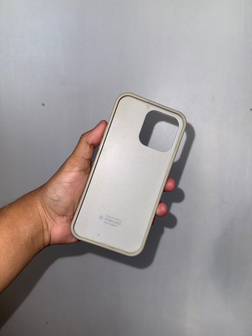 Rimowa iPhone 14 Pro Max Case (Category: Cases & Sleeves) located in Batangas. Submitted by mrkhrnndz (Listing ID 1338472303, Image 2). Description: Bought sa orange app worth 1800 Copy lang pero looks original Medio yellowish lang yung sa sides Lipa City location Pwede shipping pero sagot nyo SF.