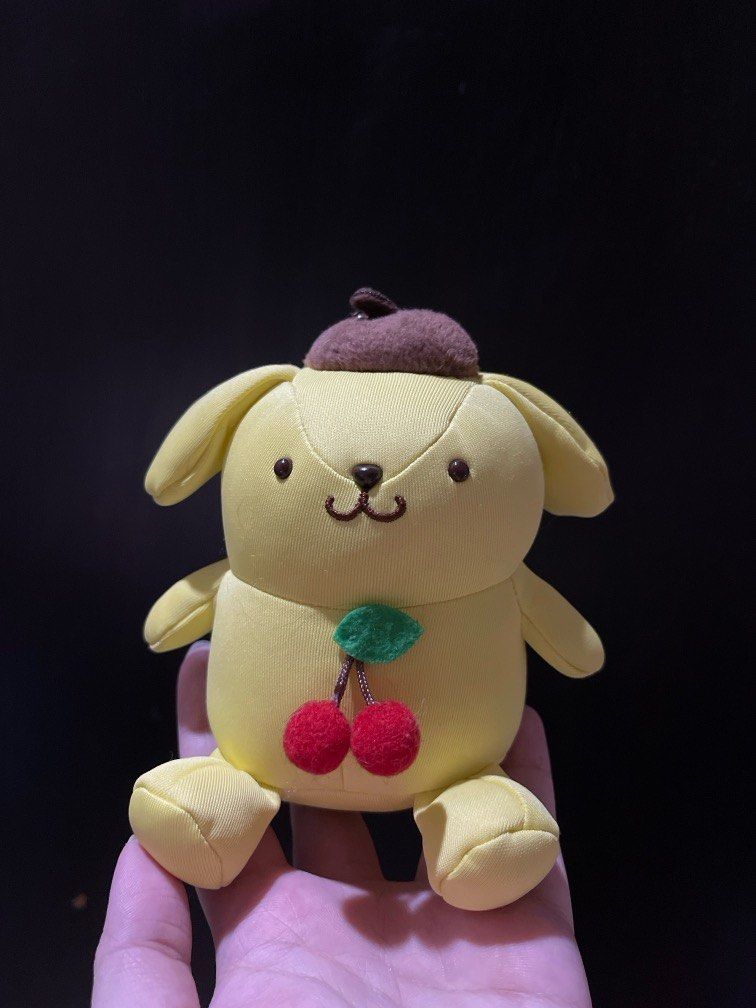 Sanrio Pompompurin Cherry plush charm (Category: Plushies & Soft Toys) located in Calamba. Submitted by itsceline (Listing ID 1338456932, Image 1). Description: Pompom with cherry 🧡 no paper tag but in good condition .