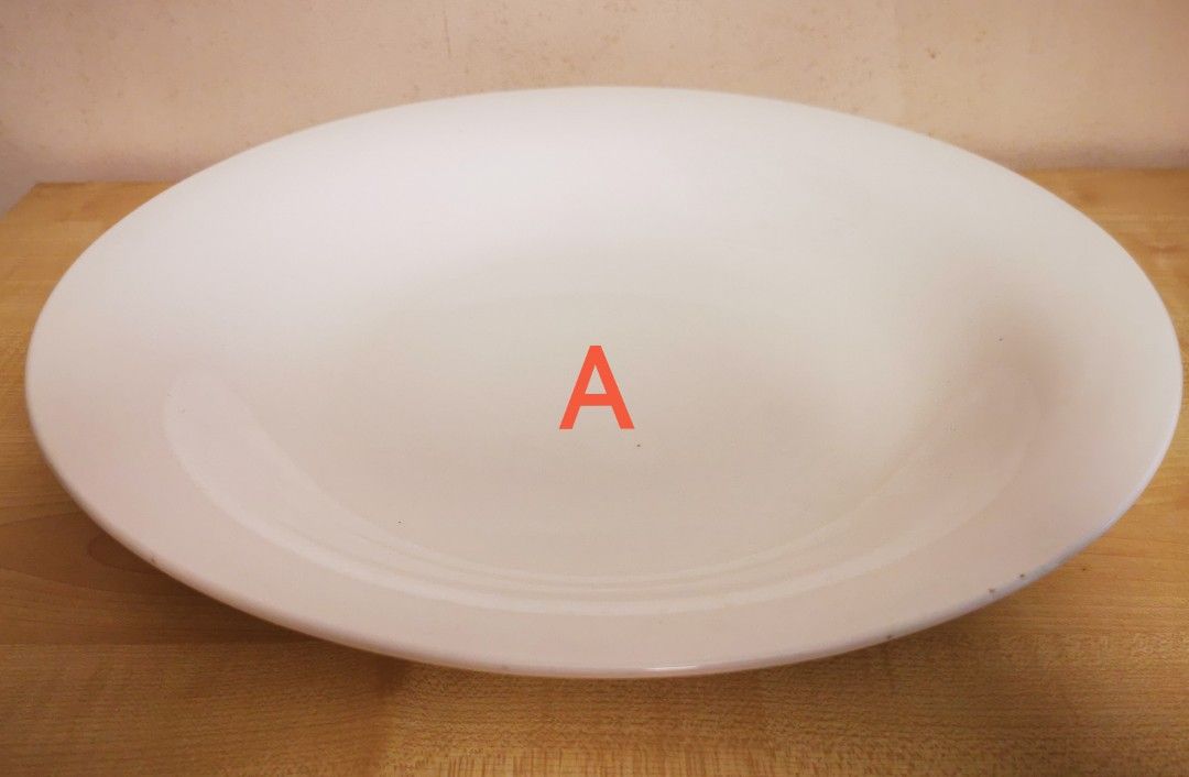 Serving Plates (Category: Dinnerware & Cutlery) located in Singapore. Submitted by onlygreat (Listing ID 1338337757, Image 1). Description: NEVER USED. Perfect for lou hei, steamed fish, etc. Diameters: A:36.4cm (deepest dish) B: 30.4cm (shallow) C: 30.4cm (shallowest) Price is per piece. Take all 3 for $10..