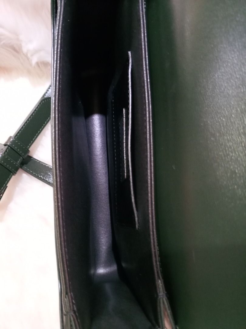 YSL SOLFERINO SLING BAG small (Category: Luxury Bags & Wallets) located in Davao. Submitted by thrift_luxefinds (Listing ID 1338386756, Image 3). Description: YSL SOLFERINO in hunter green color, calfskin leather in silver hardware, adjustable strap, with card slot and pocket inside. Bag is in pristine condition. With dust bag and box. Japan sourced. Ready to ship. Price is negotiable..