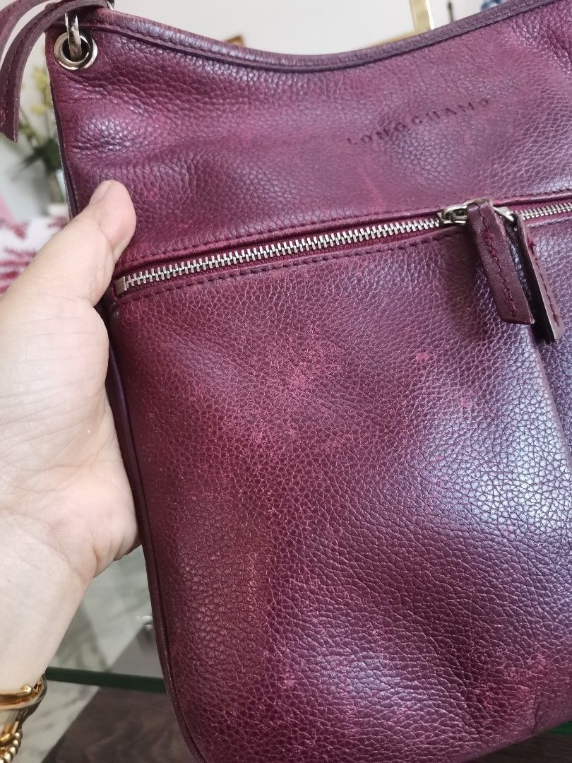 💯% Authentic Longchamp Sling (Category: Luxury Bags & Wallets) located in Paranaque City. Submitted by luxehuntsmla.bymari (Listing ID 1338496675, Image 2). Description: 💯% Authentic Longchamp Sling 🔸Scratches all over the bag's body 🔸Bag only 🔸Hardware 9/10 🔸Clean inside 🔸Flaw: please refer to posted pictures Php 1000 only (from Php 1500) FIXED! 🔸All items posted are guaranteed authentic or your money-back if proven fake by a legitimate 