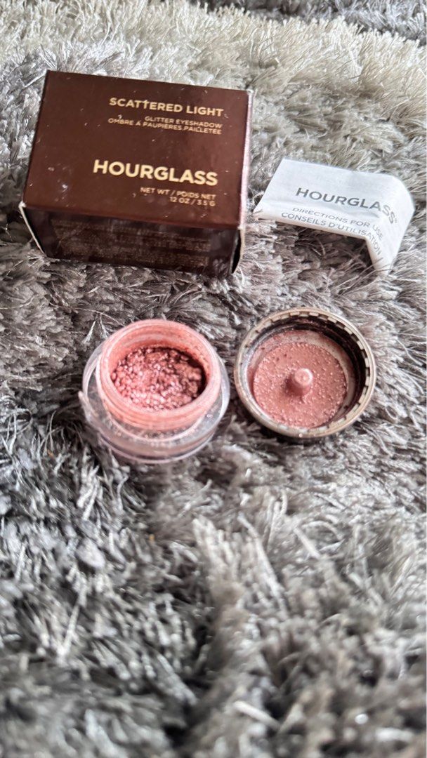 Hourglass scattered light glitter eyeshadow (Category: Makeup) located in Quezon City. Submitted by vaniteees (Listing ID 1338556743, Image 2). Description: Hourglass scattered light glitter eyeshadow Shade is AURA Check swatch on google .