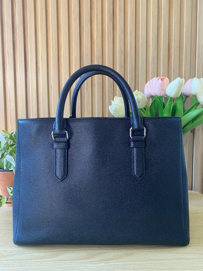 Louis Quatorze Pebbled Leather Office Bag (Category: Luxury Bags & Wallets) located in Davao. Submitted by ellie.ville (Listing ID 1338612930, Image 3). Description: - Excellent condition, this is a 2-way bag pero with this type of bag mas maganda siya talaga as hand bag and without a sling - Ganda din the leather 😍.