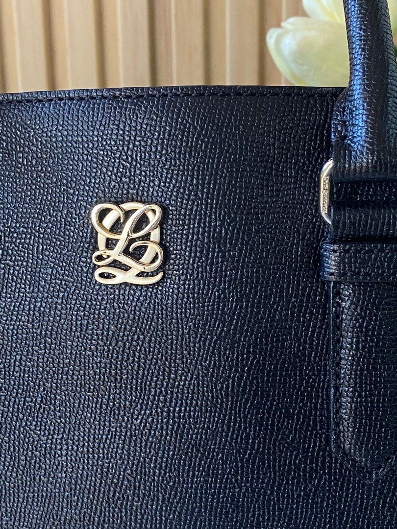 Louis Quatorze Pebbled Leather Office Bag (Category: Luxury Bags & Wallets) located in Davao. Submitted by ellie.ville (Listing ID 1338612930, Image 2). Description: - Excellent condition, this is a 2-way bag pero with this type of bag mas maganda siya talaga as hand bag and without a sling - Ganda din the leather 😍.