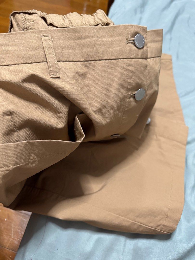 Midi skirt (Category: Skirts) located in Pasig City. Submitted by heydeclutterist2nd (Listing ID 1338603557, Image 3). Description: GU soft denim midi skirt. Caramel color. Fit small-medium. Elastic waist. Super nice in person Rfs: does not fit me anymore.