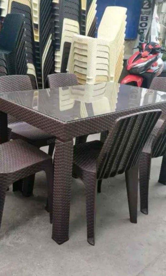 rattan table and chairs with glass (Category: Tables & Sets) located in Manila. Submitted by lunaaa25 (Listing ID 1338588752, Image 2). Description: rattan table and chairs with glass on hand brand new sale sale sale same day deliver cod gcash.