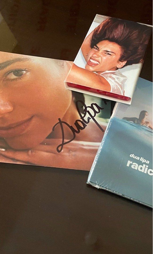 SALE Dua Lipa Signed Radical Optimism bundle (Category: CDs & DVDs) located in Manila. Submitted by stefandraboutique (Listing ID 1338522037, Image 1). Description: SALE Dua Lipa Signed Radical Optimism bundle (laminate CD, cassette, signed card) for 3500 php 💙.