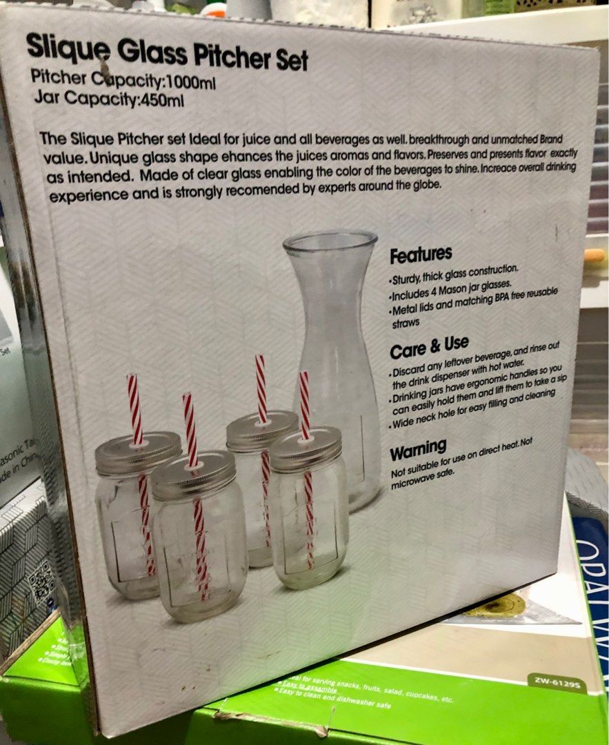 Slique Glass Pitcher Set (Category: Pitchers & Dispensers) located in Quezon City. Submitted by polluxfineshop (Listing ID 1338501894, Image 2). Description: Slick glass pitcher set with 4 mason jars and straw. Pitcher capacity: 1000 ml. Jar capacity: 450 ml. Sturdy, thick glass construction. .