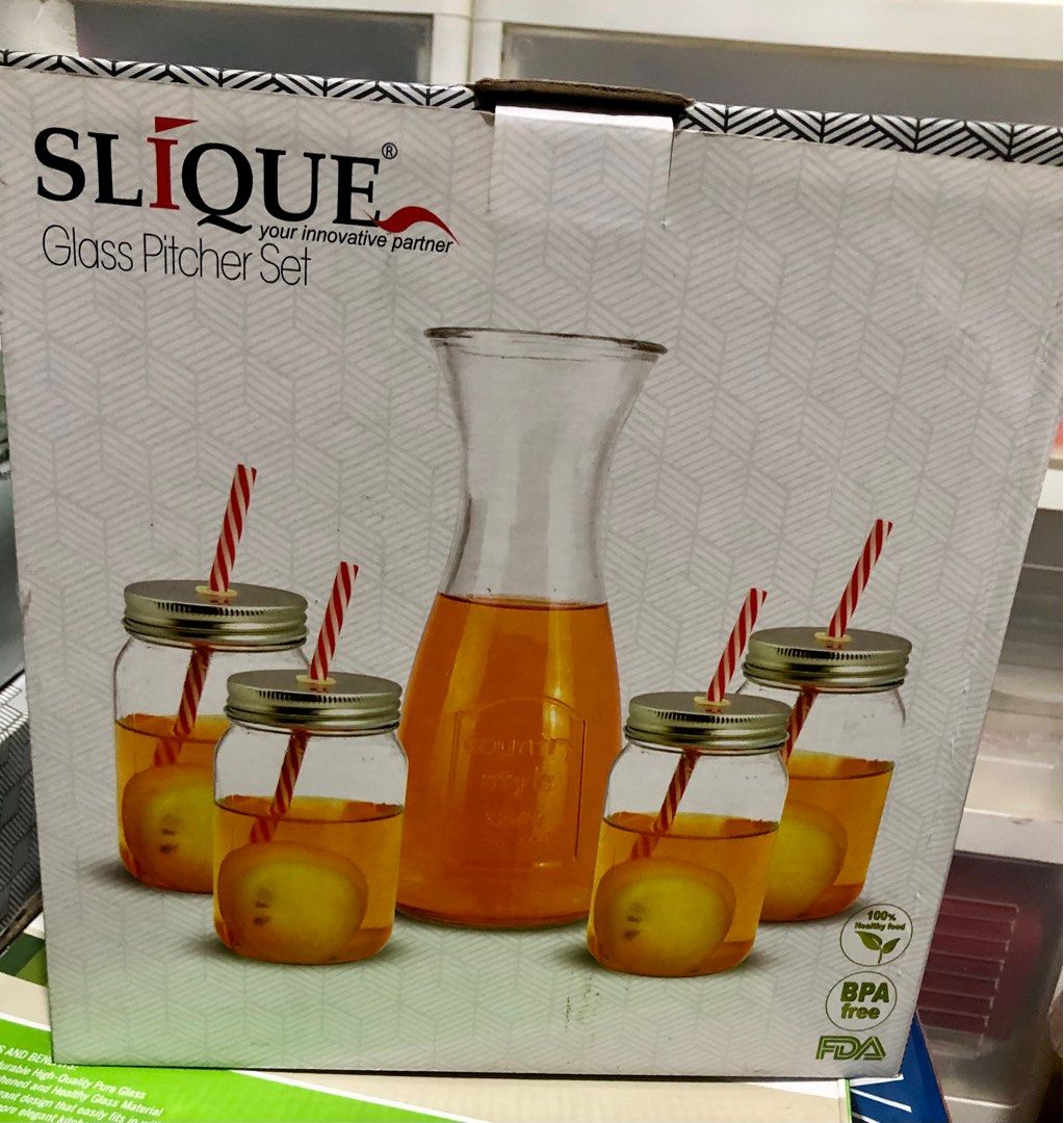 Slique Glass Pitcher Set (Category: Pitchers & Dispensers) located in Quezon City. Submitted by polluxfineshop (Listing ID 1338501894, Image 1). Description: Slick glass pitcher set with 4 mason jars and straw. Pitcher capacity: 1000 ml. Jar capacity: 450 ml. Sturdy, thick glass construction. .