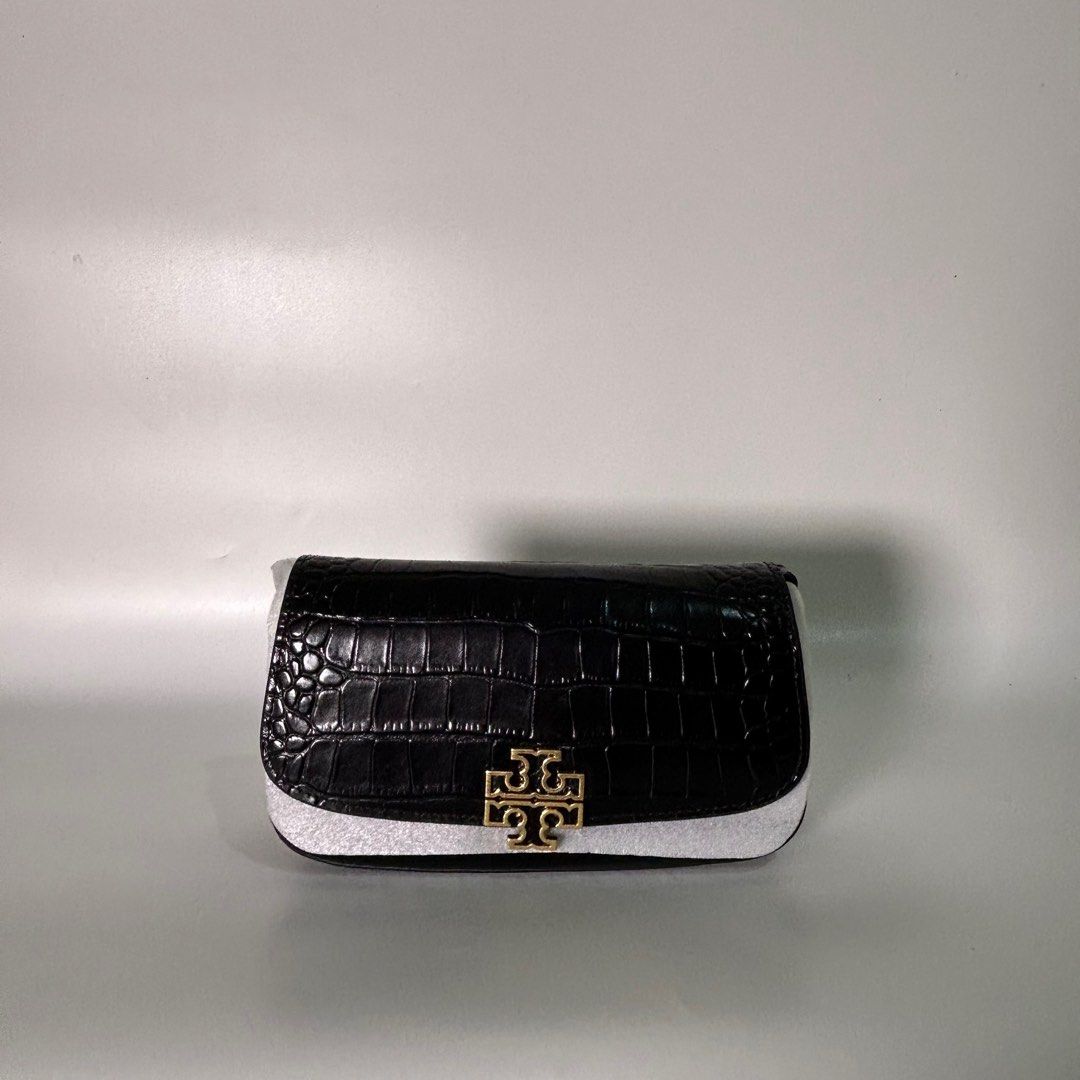Tory Burch Britten Convertible Crossbody (Category: Luxury Bags & Wallets) located in Makati City. Submitted by lux.mariah (Listing ID 1338613028, Image 1). Description: 💯 Guaranteed authentic Complete Inclusions with Paperbag. Mop: Gcash / Maya / Bdo Mode of Delivery: J&t / Lalamove.