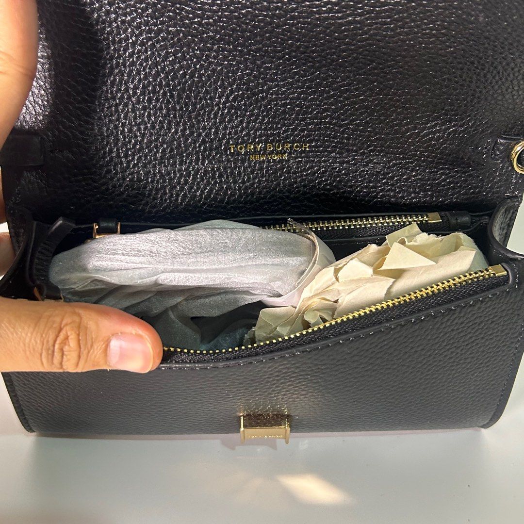 Tory Burch Thea Flap Crossbody (Category: Luxury Bags & Wallets) located in Makati City. Submitted by lux.mariah (Listing ID 1338615375, Image 3). Description: 💯 Guaranteed authentic Complete Inclusions with Paperbag. Mop: Gcash / Maya / Bdo Mode of Delivery: J&t / Lalamove.