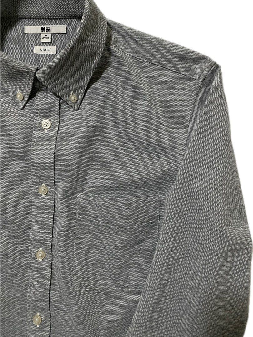 Uniqlo Long-sleeved Collared Shirt (Category: Formal Shirts) located in Makati City. Submitted by vanharoldocharan (Listing ID 1338482419, Image 2). Description: Colour: Grey Textile: Cotton blend Size: M [Slim Fit] on tag (see photos for dimensions) No issues MOP: GCash.