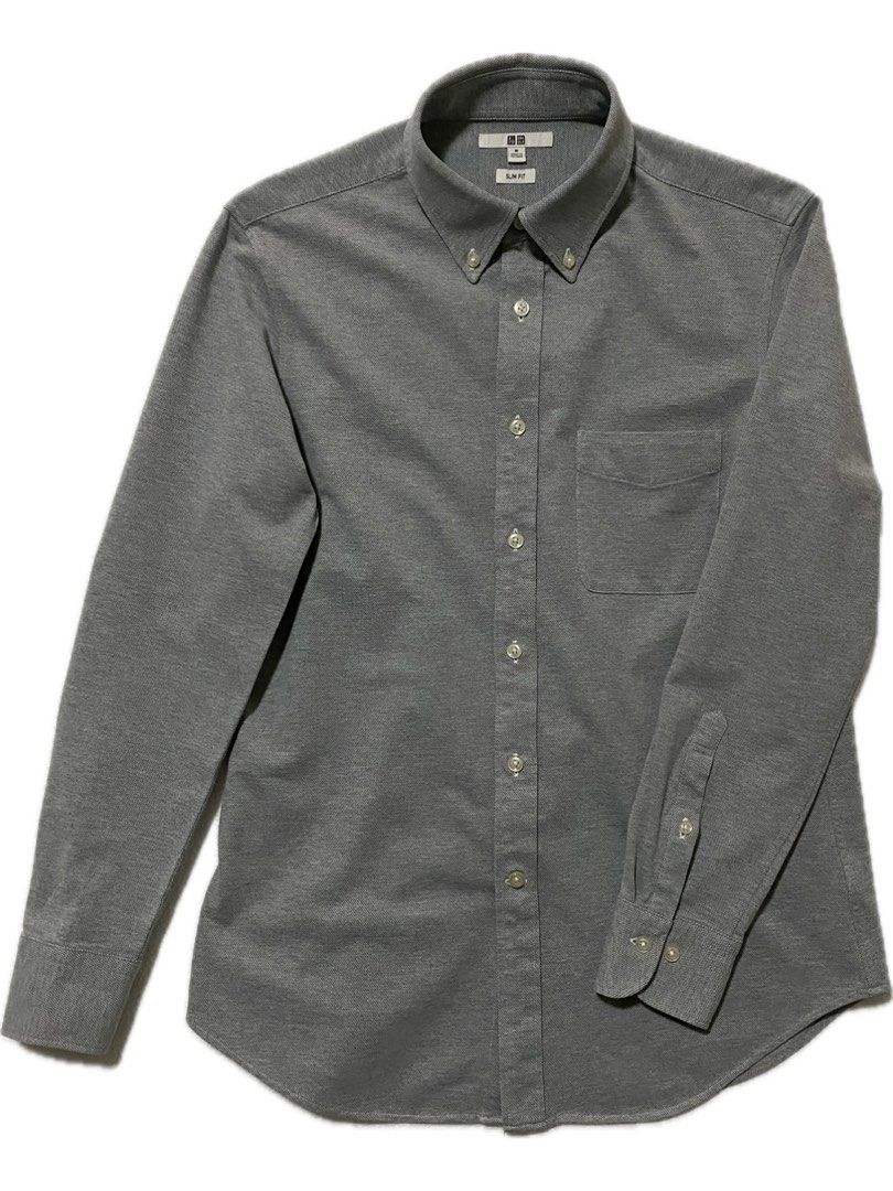 Uniqlo Long-sleeved Collared Shirt (Category: Formal Shirts) located in Makati City. Submitted by vanharoldocharan (Listing ID 1338482419, Image 1). Description: Colour: Grey Textile: Cotton blend Size: M [Slim Fit] on tag (see photos for dimensions) No issues MOP: GCash.