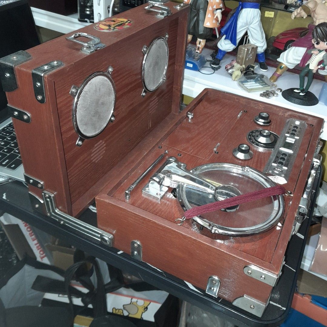 Wooden Radio CD Player (Category: Portable Music Players) located in Baguio. Submitted by shellcollector (Listing ID 1338541257, Image 3). Description: Portable wooden radio CD player Retro vintage look Working radio AM and FM Working CD player Faulty CD cover lock, needs strap to close and play CD 4800 Pesos Baguio loc Shipping at buyer's cost.