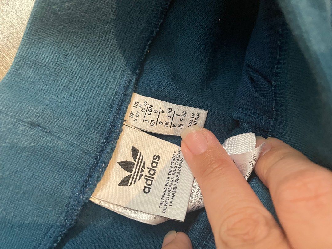 Adidas Set (Category: Babies & Kids Fashion) located in Quezon City. Submitted by cheechchong (Listing ID 1338704059, Image 3). Description: Take all - please check photos for the condition and sizes 2 shirt, 2 shorts, 1 pants and 1 cap.