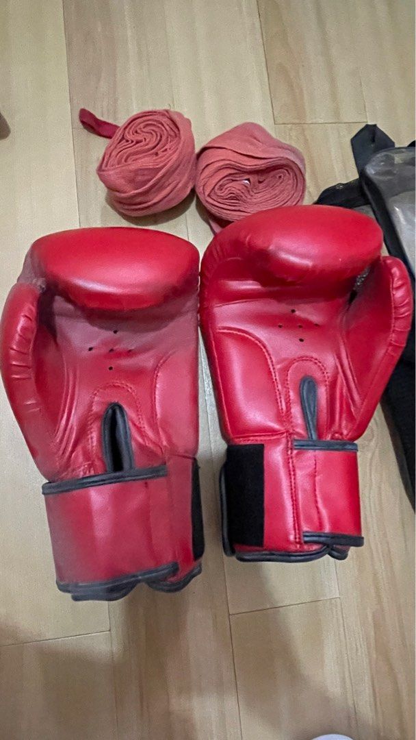 Boxing gloves (Category: Cardio & Fitness Machines) located in Taguig. Submitted by christ.ine (Listing ID 1338685961, Image 3). Description: Genuine Leather (Buffalo Leather) • High Performance Gloves • High density European PU Mold Padding • Velcro Strap to Support the wrist Size 10. Please check photos for reference. MOP Gcash/BPI. Payment first before shipping. .