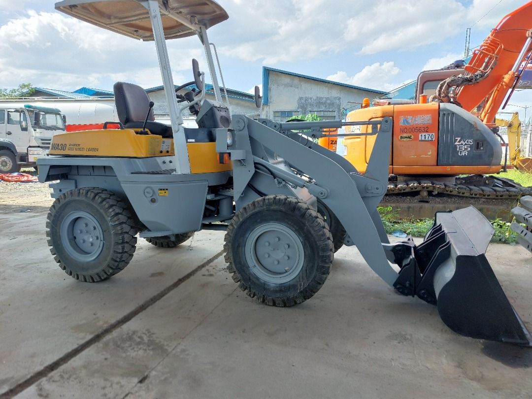 KOMATSU MINI LOADER WA30-5 (Category: Construction Tools & Equipment) located in Quezon City. Submitted by pgsc-ecomac (Listing ID 1338717560, Image 2). Description: KOMATSU MINI LOADER WA30-5 - Newly arrived and on stock - Negotiable upon viewing in L1-A-2 MGM Compound Bagbaguin Caloocan City (near RC Cola Plant P. Dela Cruz St.) NEWLY ARRIVED KOMATSU MINI LOADER WA30-5 Canopy type and Solid tires Capacity: 0.43cubic Year model: 1996 Hour meter: