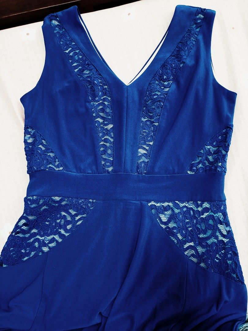 Mags Evening Long Gown (Category: Evening dresses & gowns) located in Manila. Submitted by mhonicz (Listing ID 1338742585, Image 2). Description: Mags Evening Long Gown - Color : Dark Royal Blue - V neck style, sleeveless w/ slit - Semi satin fabric with double linings - Tag, Mags - Fit medium to large body frame - Waist line 26 to 30 - Suitable in any formal / evening occasions - RFS: one time use (evening party) needs to declutter - Mode of pay