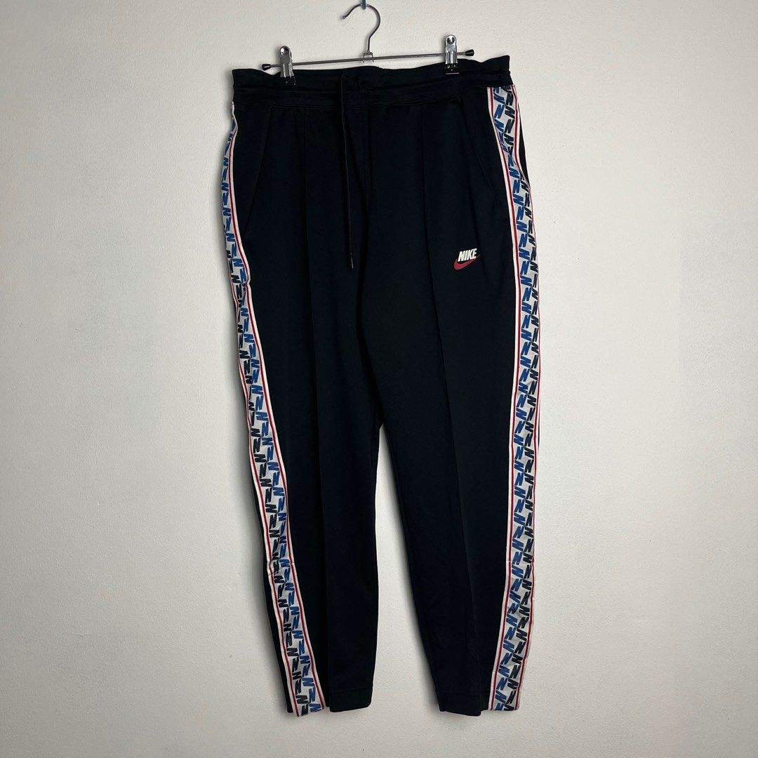 Nike Taped Poly Pant Men s Fashion Bottoms Joggers on Carousell