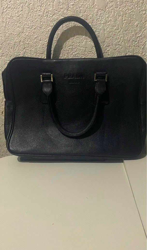 Prada document bag (Category: Luxury Bags & Wallets) located in Makati City. Submitted by fabiloushop (Listing ID 1338805344, Image 2). Description: Prada document or laptop bag Legit with code and plate Size 11x16(width).