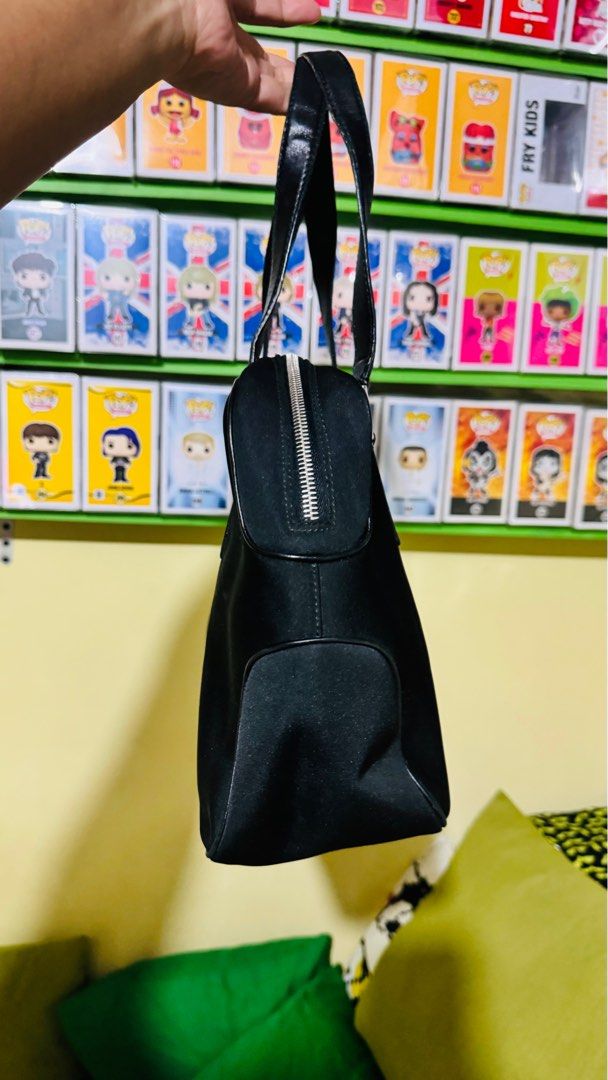 Salvatore Ferragamo Handbag Nylon (Category: Luxury Bags & Wallets) located in Manila. Submitted by tanjohnrn (Listing ID 1338750203, Image 2). Description: Salvatore Ferragamo Nylon Material Handbag Used but not abused 9-9.5/10 Originally bought in Japan Used moderately No signs of abuse With noticeable signs of usage Includes dust bag only MOP: Gcash / BPI For NCR buyer only Shipping: lalamove, grab express only. Cannot accommodate local courie