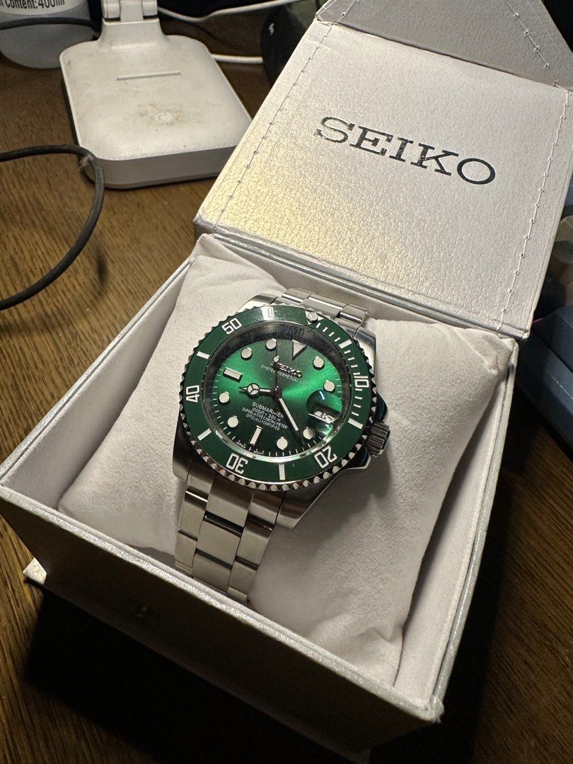 Seikolex Submariner Hulk (Category: Men's Watches) located in Quezon City. Submitted by bradd09 (Listing ID 1338811389, Image 3). Description: Seikolex Mods Hulk Submariner Inclusions: Unit and box Specs: - sapphire crystal dome - 40mm - Seiko NH35 movement - 20mm strap width - green lume - date function Quezon City meetup only or via shipping (payment first via lalamove or COD LBC) Message me for inquiries or your preferred designs .