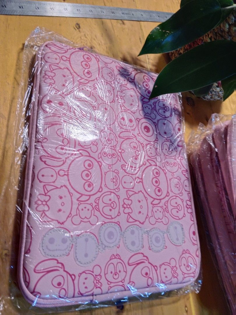 Tsumtsum disney/pixar loptop bag (Category: Luxury Bags & Wallets) located in Baguio. Submitted by adulagan1998258 (Listing ID 1338748521, Image 2). Description: w/ etiketa like new based on the "winnie the pooh 5 pcs avail like new pa sila from hongkong box 14x10 ".