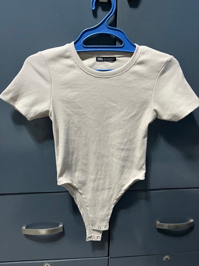 Bodysuit beige (Category: Blouses) located in Malabon City. Submitted by manymoon (Listing ID 1338954031, Image 1). Description: Can fit XS-S Buttons working (Not orig zara) Price negotiable.