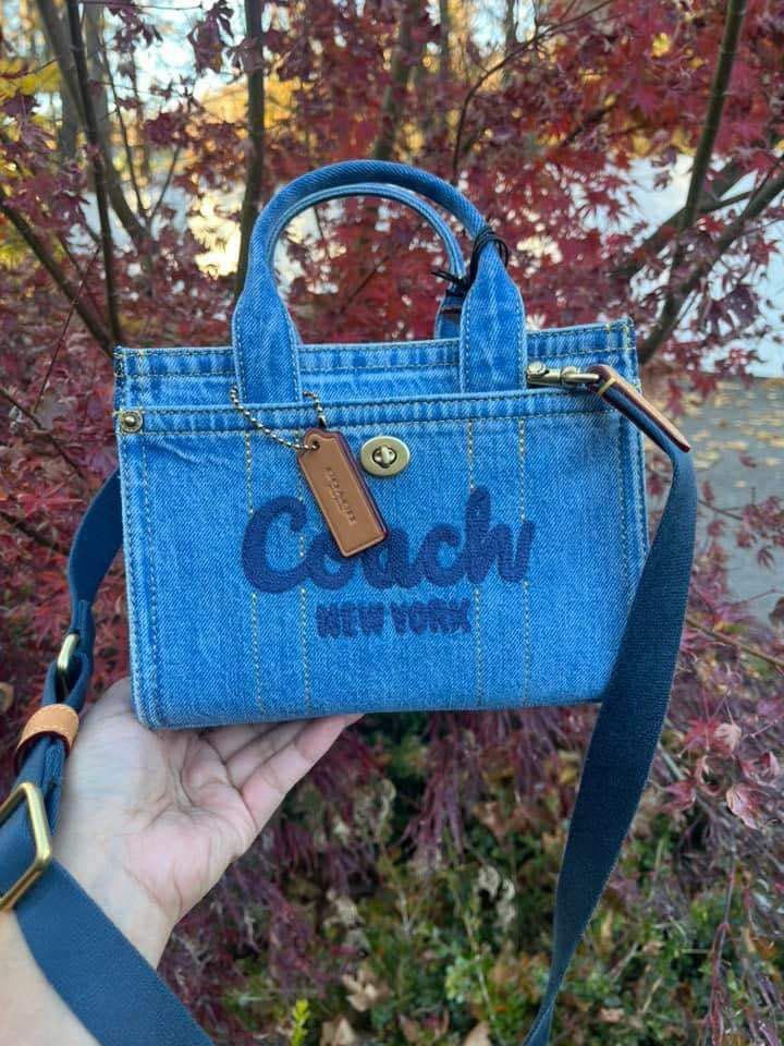 Coach Mini Denim Cargo (Category: Luxury Bags & Wallets) located in Rizal. Submitted by LuxbyMarifrance (Listing ID 1338879432, Image 2). Description: 🏷️ 2,600 only + SF 🧳 Coach Mini Denim Cargo 📏 7-3/4”W x 6”H x 4-1/4”D 📌 with dust bag, paper bag and care card ✨All trademarks, logos and brand names are reserved and property of the original brand owner. #coachph #authenticqualitybagsph #authenticqualitybags #lowestpriceguaranteed #cochfactory