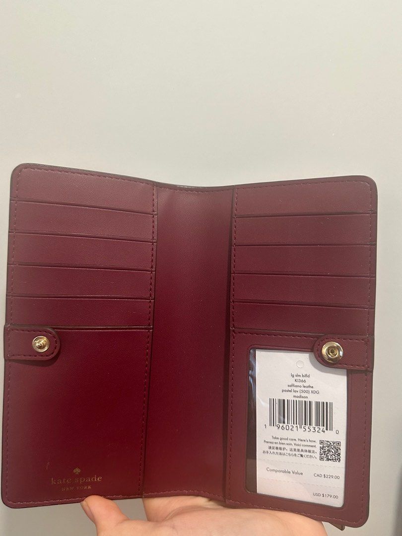 Purple kate spade wallet deals