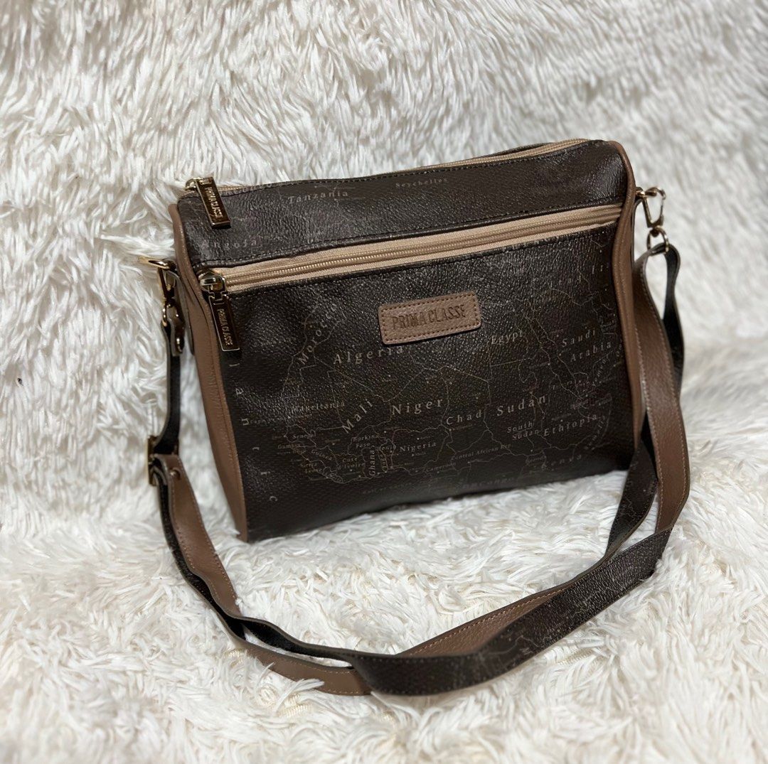 Prima Classe Sling (Category: Luxury Bags & Wallets) located in Baguio. Submitted by mischasboutique (Listing ID 1338825569, Image 1). Description: Prima Classe Sling Like new.