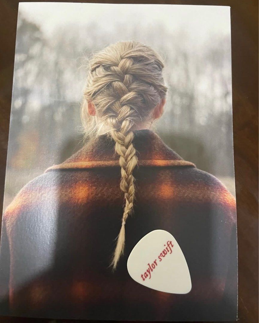 Taylor Swift Evermore Postcard + Guitar Pick (Category: CDs & DVDs) located in Manila. Submitted by stefandraboutique (Listing ID 1338875612, Image 1). Description: SOLD as set available for 1250 php .