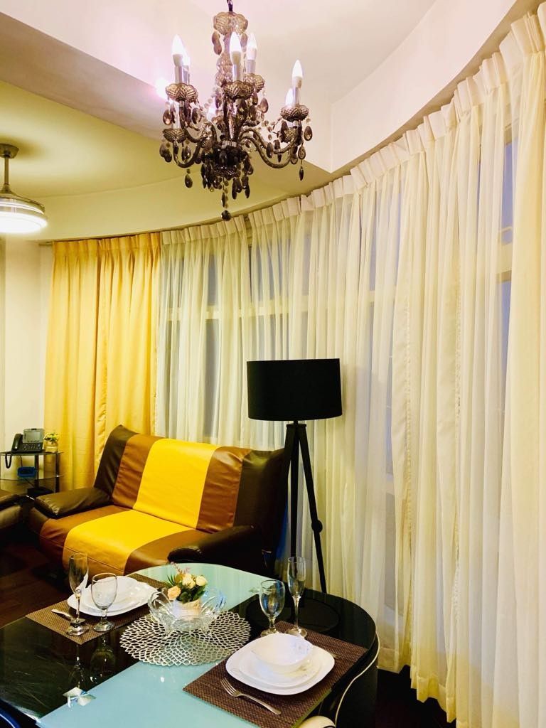 Twin Oaks Place Condominium (Category: Apartments & Condos) located in Valenzuela. Submitted by absolutelychick (Listing ID 1338901024, Image 3). Description: 1 Bedroom with Veranda Corner Unit Facing Laguna de Bay/Laguna Lake 🏞 45.32 sq.m. Fully furnished - with new glass square type dining table for 4 - new sofa set Building is with: ● Lifts ● Gym 🏋‍♀️ ● Pool 🏊‍♂️ ● Function rooms ● Maintenance ● 24/7 front desk personnel 🛎 ● Guards and CCT