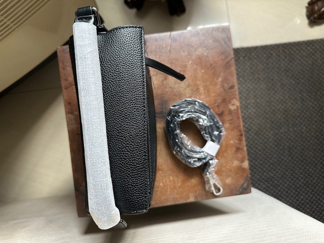 Black puzzle bag lookalike (Category: Cross-body Bags) located in Pasig City. Submitted by Bbbb123 (Listing ID 1334254831, Image 3). Description: Brand new.