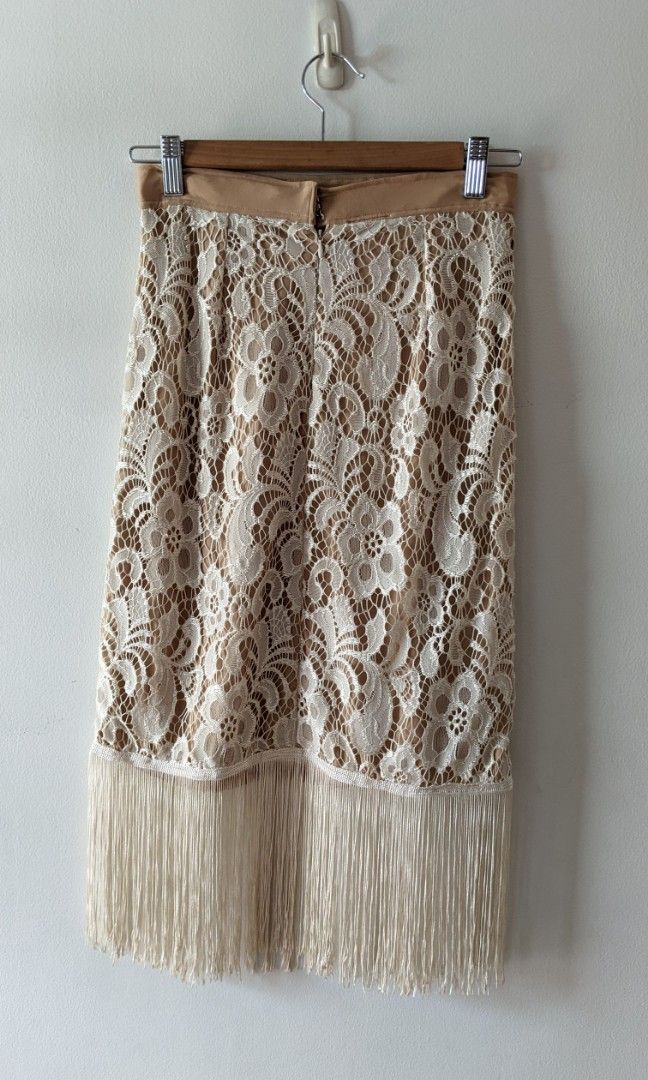 Lace skirt with boho fringe (Category: Skirts) located in Mandaluyong City. Submitted by clf97 (Listing ID 1334201582, Image 2). Description: Dainty lace skirt with bohemian fringe, perfect for flapper themed parties. Very trim waist..